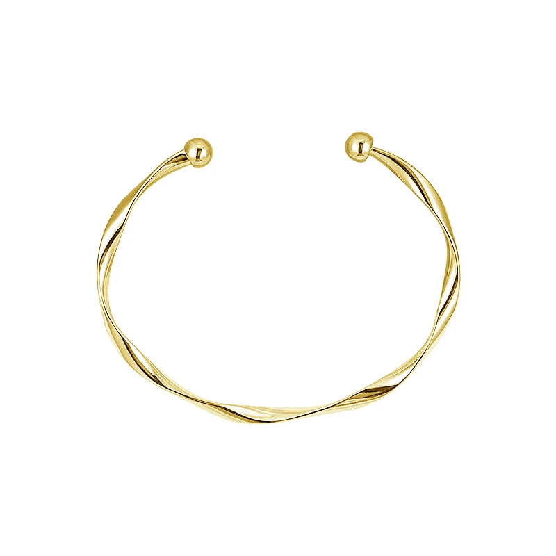 Minimalistisches Manschettenarmband aus gedrehtem Metall